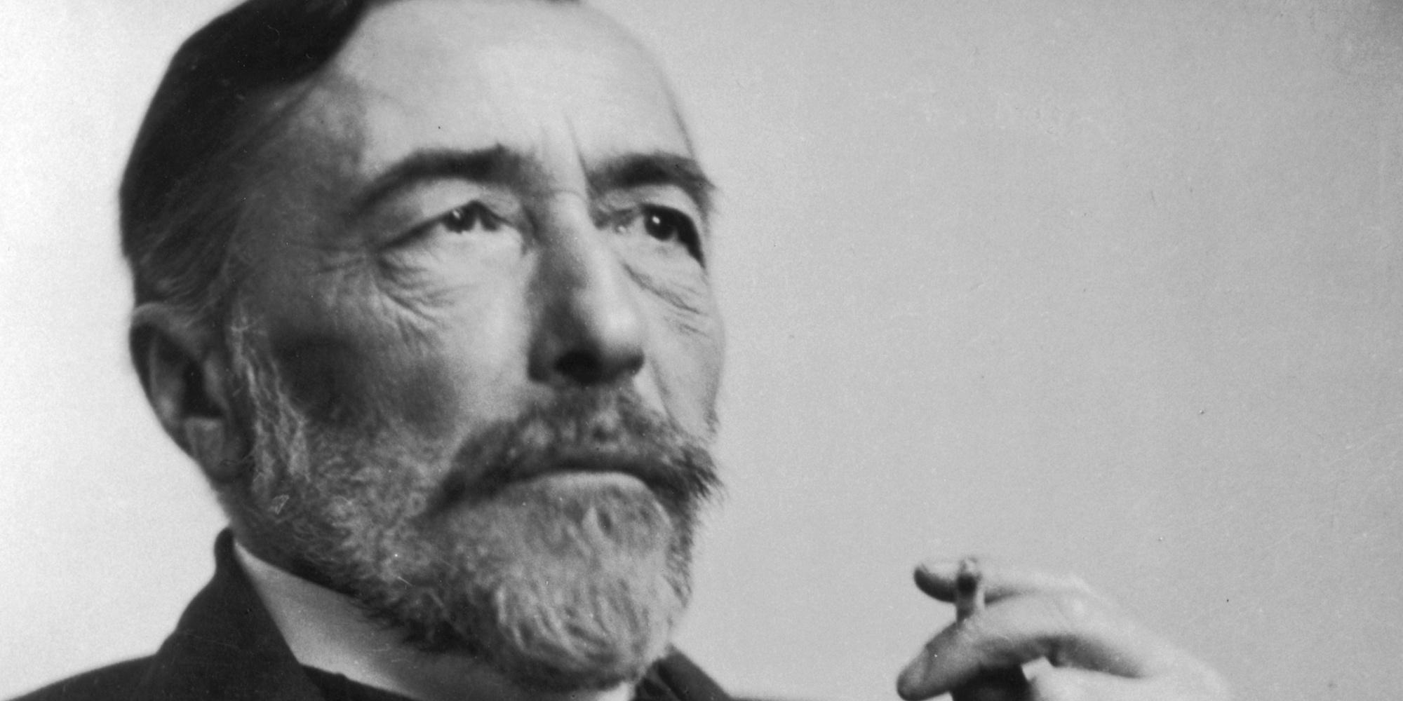 11th March 1916: Studio portrait of Ukrainian-born author Joseph Conrad (1857 - 1924) holding a cigarette.