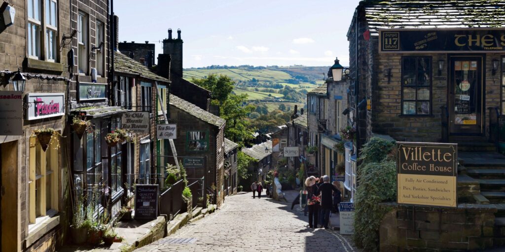 The main street in the village of Haworth, West Yorkshire, England, UK