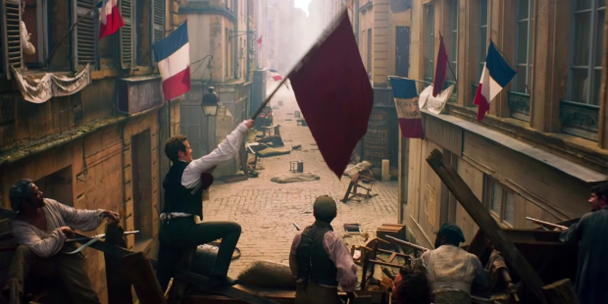 still of the barricade from Les Misérables