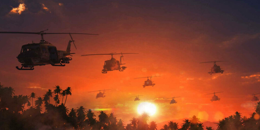 image of 'Huey' helicopters at sunset